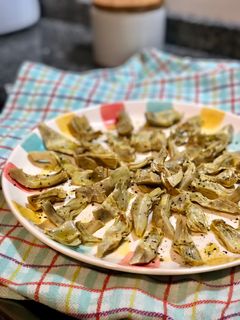 Una foto de Alcachofas en lékué con limón y pimienta