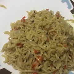 A picture of Noodles and Boiled egg.