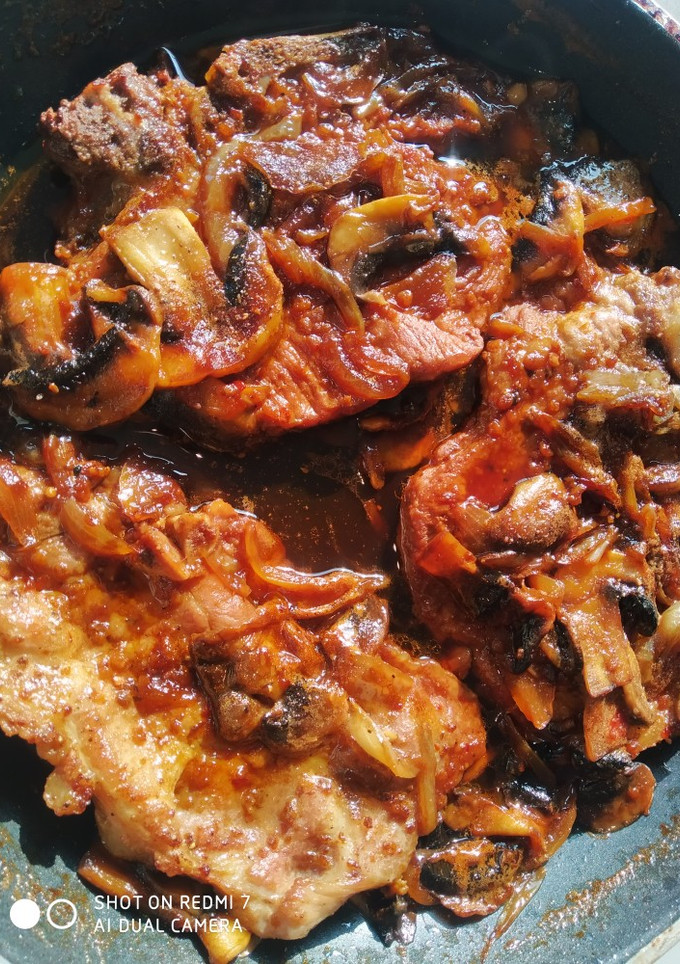 Una foto de Chuletas de cerdo en salsa de cola