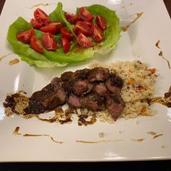 A picture of Lamb Tenderloin with a Whiskey Maple Syrup Sauce.