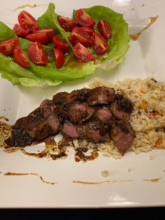 A picture of Lamb Tenderloin with a Whiskey Maple Syrup Sauce.