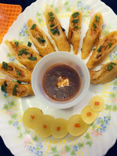 A picture of Cheesy spring rolls.
