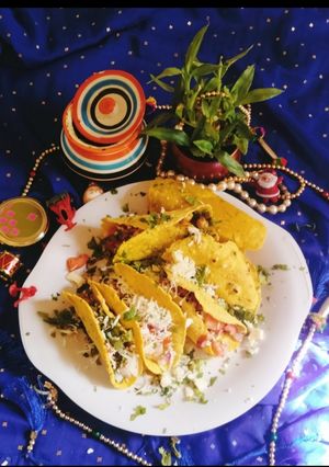 A picture of Tacos (vegetarian masala Tacos).