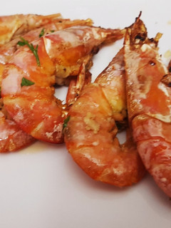 Una foto de Gambas a la plancha al brandy