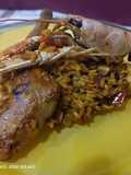 Arroz con manitas de conejo, cigalas, sepia y langostinos