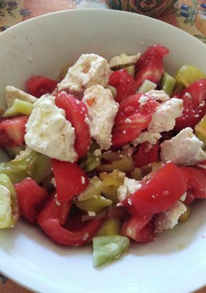 A picture of Favorite Tomato Salad 🍅🥒🧀.