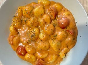 Una foto de Ñoquis con Salsa Cremosa de Cherry 🍎