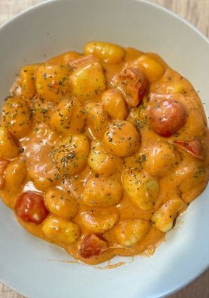 Una foto de Ñoquis con Salsa Cremosa de Cherry 🍎