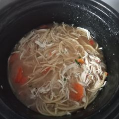 A picture of Slow cooked chicken noodle soup.