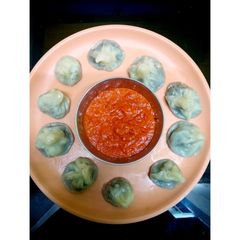 A picture of Cabbage steamed momos(with pictures) and Chutney.