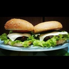 A picture of Mutton Cheese Burgers with mayo chilli dip🍔😋.