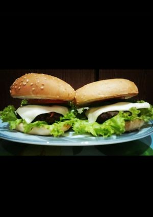 A picture of Mutton Cheese Burgers with mayo chilli dip🍔😋.