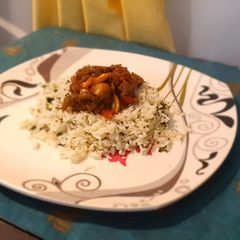 Butter Parsley Rice and Veggies in Home Style Hunan Sauce A picture of Butter Parsley Rice and Veggies in Home Style Hunan Sauce.