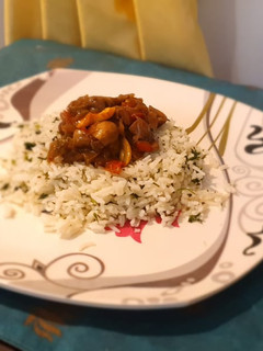 A picture of Butter Parsley Rice and Veggies in Home Style Hunan Sauce.