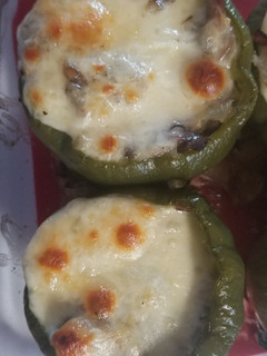 A picture of Philly cheese steak stuffed peppers.