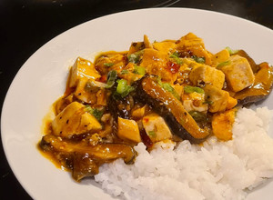 A picture of Spicy Mapo Tofu with Shiitake Mushrooms 🌶️.