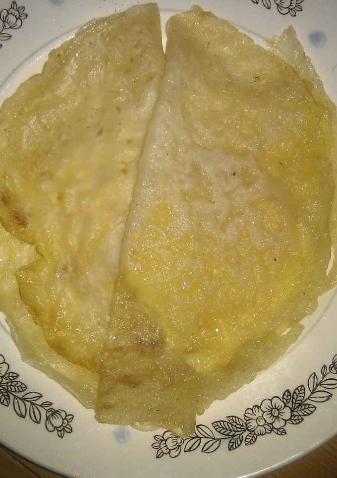 Una foto de Crepes con queso y cebolla