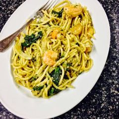 A picture of Shrimp Spaghetti with a Pesto Cream Sauce.