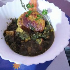 Paneer in green gravy A picture of Paneer in green gravy.