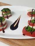 Caprese con pesto e glassa balsamica