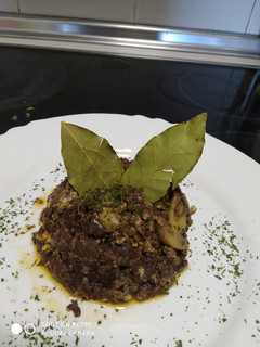 Una foto de Revuelto de morcilla con champiñones