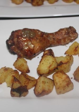Una foto de Muslitos con Patatas en Freidora de Aire