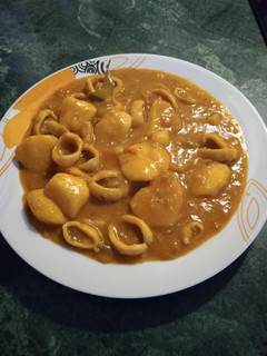 Una foto de Guiso de papas con calamares