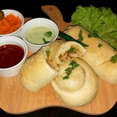 A picture of Chicken cheese dinner rolls.
