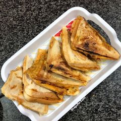 Potato sandwich with leftover chicken A picture of Potato sandwich with leftover chicken.