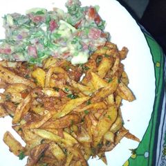A picture of Chips masala with gaukamole.