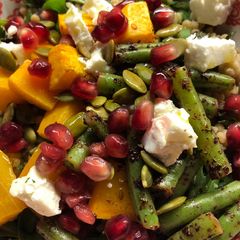 A picture of Buddha bowl: butternut squash and green beans.