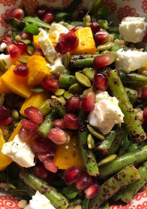A picture of Buddha bowl: butternut squash and green beans.