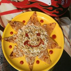 A picture of Cheesy sunflower prantha.