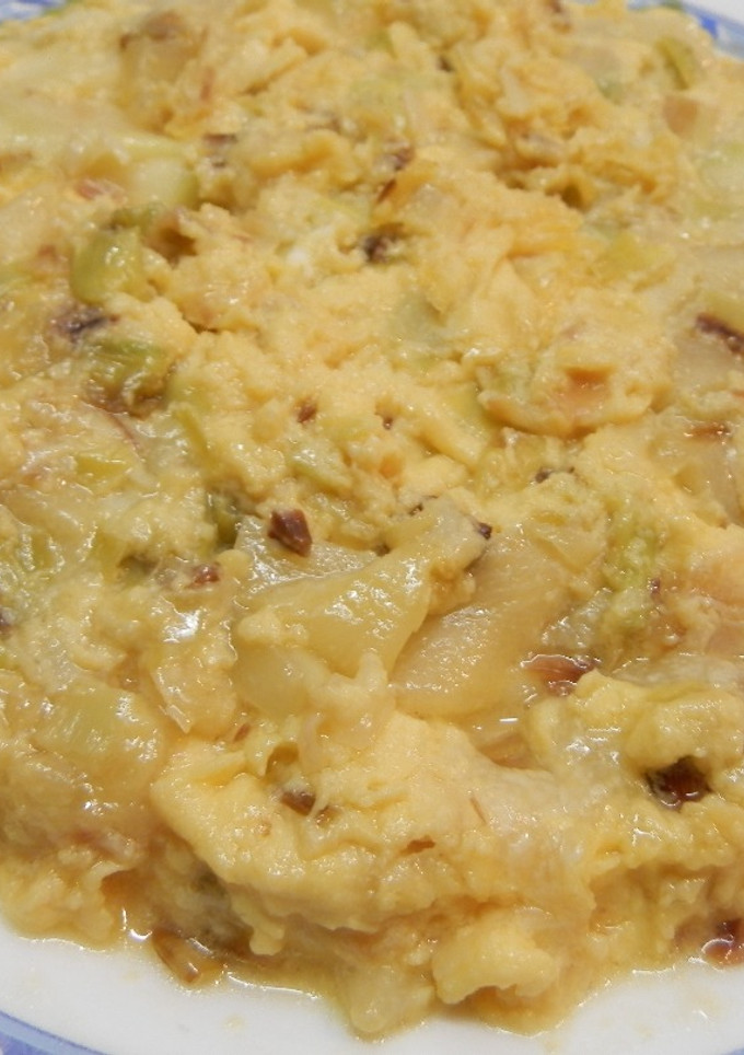 Una foto de Tortilla de calabacín con puerros y queso manchego