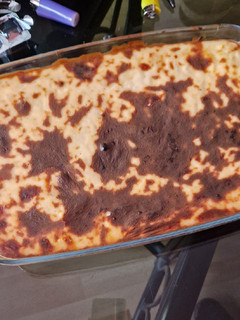Una foto de Canelones de carne con bechamel
