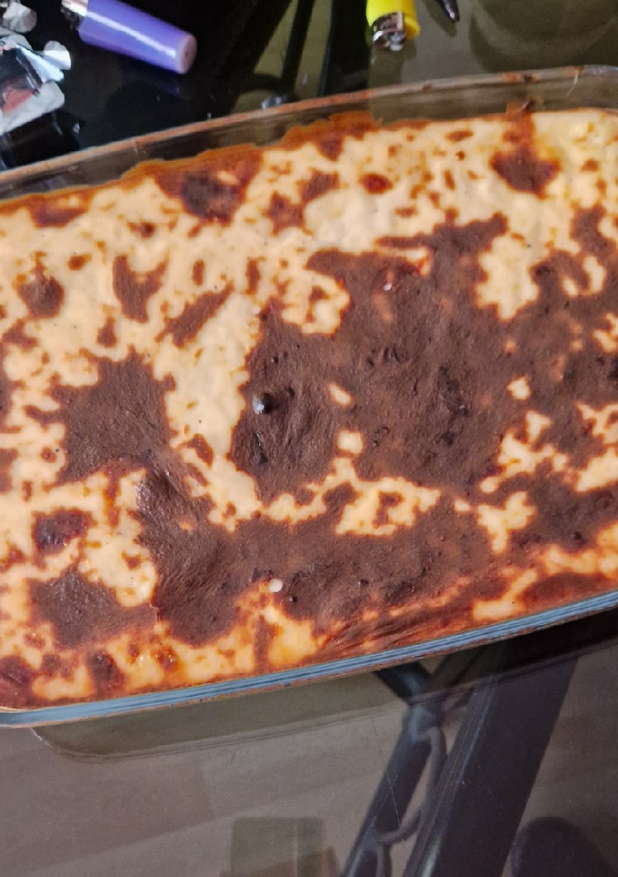 Una foto de Canelones de carne con bechamel