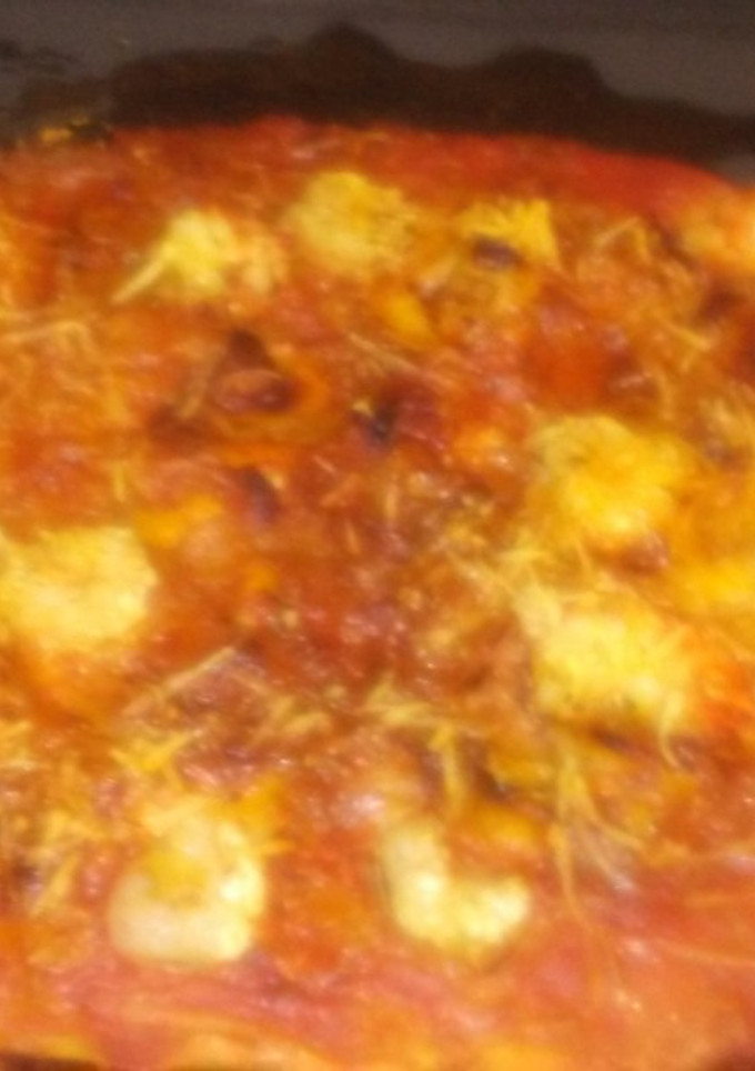 Una foto de Pizza de marisco
