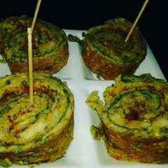 A picture of Cheesy Pudla Pinwheel.