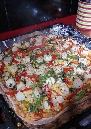 Una foto de Pizza vegetariana