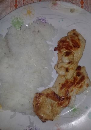 Una foto de Arroz con bife de pechuga