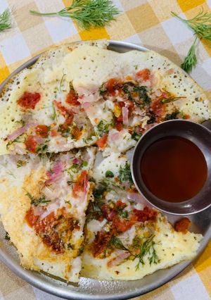 A picture of Tomato Onion Dill Utthapam.