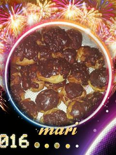 Una foto de Petisuis de crema pastelera y chocolate