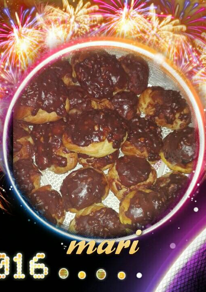 Una foto de Petisuis de crema pastelera y chocolate 