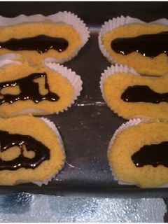 Una foto de Magdalenas de mandarina con chocolate