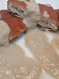 Una foto de Cachopo de cerdo con champiñones