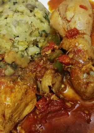 A picture of Mashed potatoes with chicken curry.