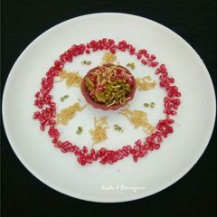 A picture of Moong chat in barley beetroot tart.