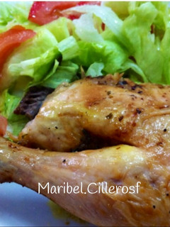 Una foto de Muslos de pollo al horno