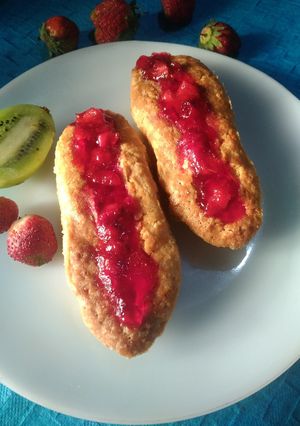 A picture of Hotdog shaped cake with strawberry jello.