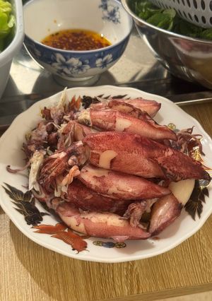 Hình của món Mực hấp EatWell.
